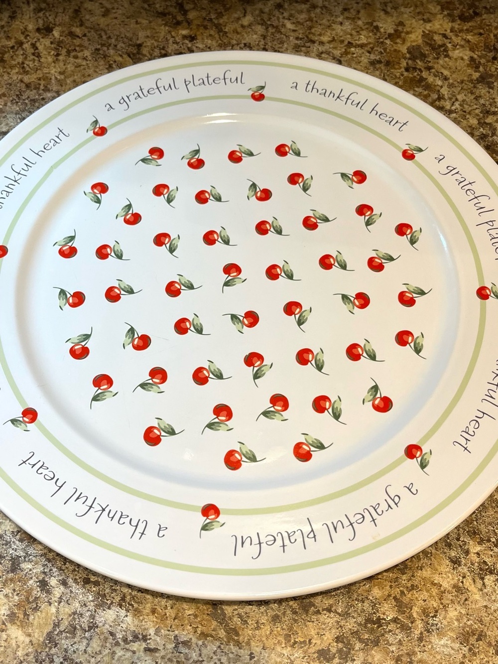 12-inch ceramic "giving plate" made by Hallmark featuring a red cherry design